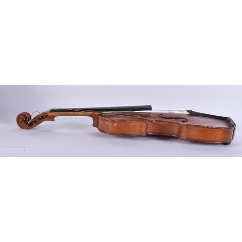 914 - A VIOLIN together with two wall brackets. (3)