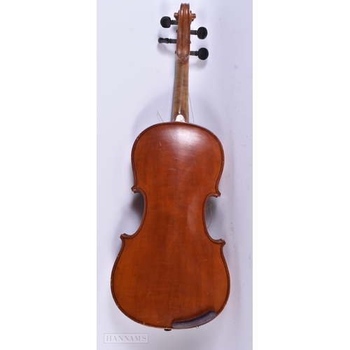 914 - A VIOLIN together with two wall brackets. (3)