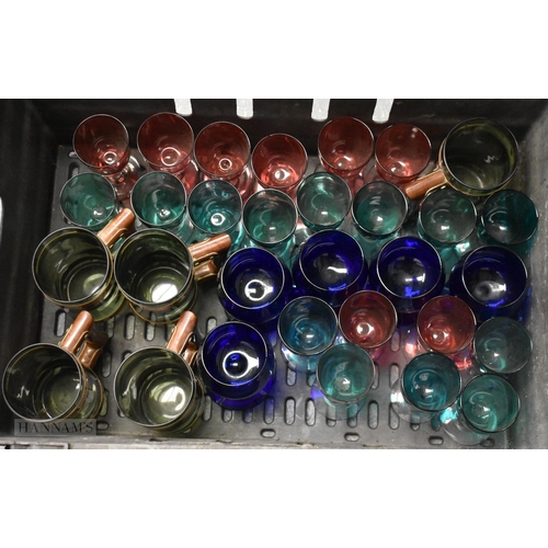 919 - A COLLECTION OF VINTAGE COLOURED DRINKING GLASSES. Largest 15 cm high. (qty)
