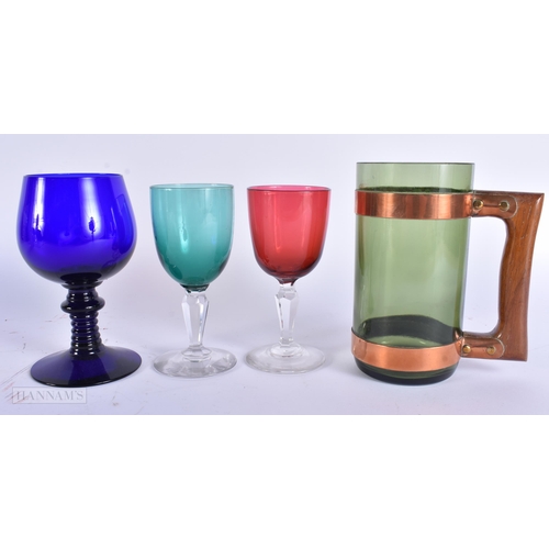 919 - A COLLECTION OF VINTAGE COLOURED DRINKING GLASSES. Largest 15 cm high. (qty)