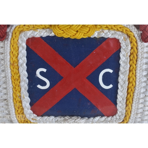 920 - A LARGE SAILORS MARITIME EMBROIDERED KNOT DISPLAY. 66 cm x 56 cm.