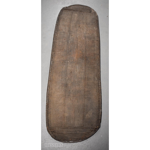 925 - TWO LARGE AFRICAN TRIBAL SHIELDS. Largest 140 cm x 45 cm. (2)