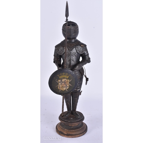 930 - A MINIATURE SUIT OF ARMOUR. 28 cm high.