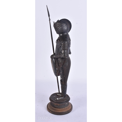 930 - A MINIATURE SUIT OF ARMOUR. 28 cm high.