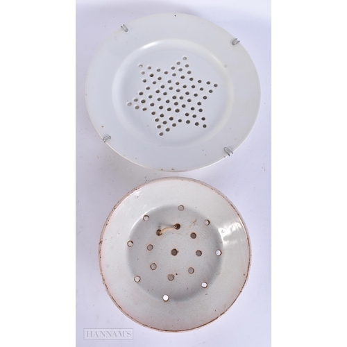 931 - TWO ANTIQUE POTTERY STRAINING DISHES. Largest 23 cm diameter. (2)