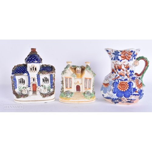 934 - TWO 19TH CENTURY STAFFORDSHIRE POTTERY GROUPS together with a Masons jug. 16 cm x 12 cm. (3)