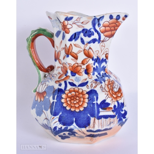 934 - TWO 19TH CENTURY STAFFORDSHIRE POTTERY GROUPS together with a Masons jug. 16 cm x 12 cm. (3)