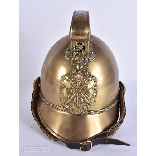 936 - A BRASS FIREMANS HELMET. 28 cm x 24 cm.