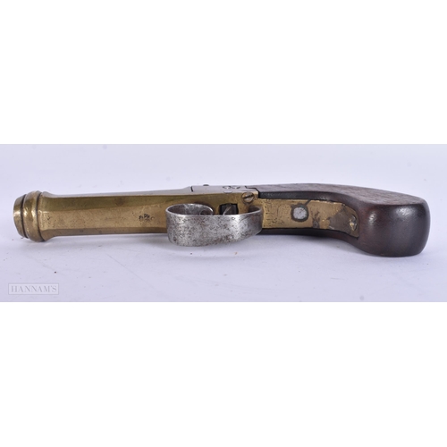 938 - A VERY RARE ANTIQUE CAST IRON PISTOL TRAP together with a smaller antique pistol. Largest 18 cm wide... 