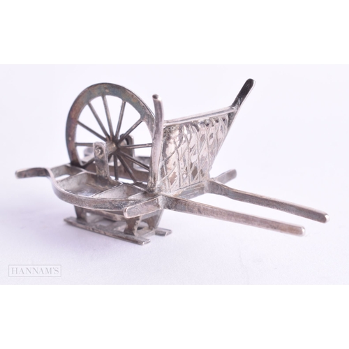 778 - AN ANTIQUE CHINESE MODEL. 13.6 grams. 3 cm x 6.5 cm.