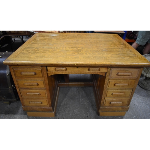 3996 - A substantial vintage oak Partners desk by Shannon 89 x 151 x 121cm