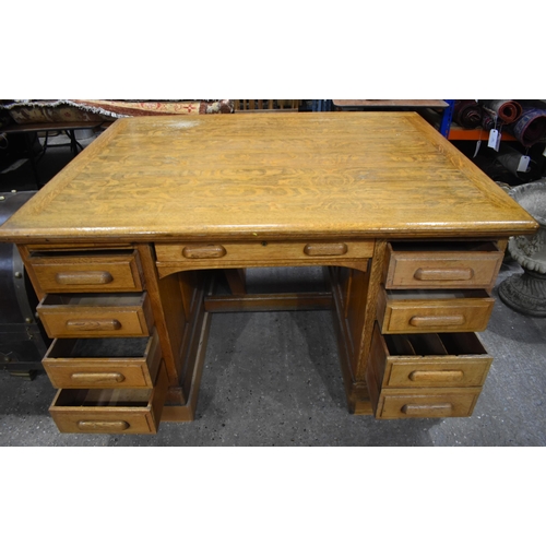 3996 - A substantial vintage oak Partners desk by Shannon 89 x 151 x 121cm