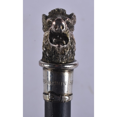 242 - AN ANTIQUE SILVER MOUNTED BOAR HEAD WALKING STICK. 100 cm long.