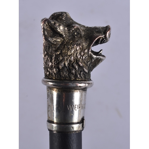 242 - AN ANTIQUE SILVER MOUNTED BOAR HEAD WALKING STICK. 100 cm long.