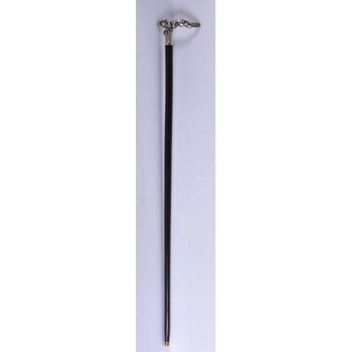 243 - AN ANTIQUE SOLID SILVER RUBY EYED FOX WALKING CANE. 95 cm long.