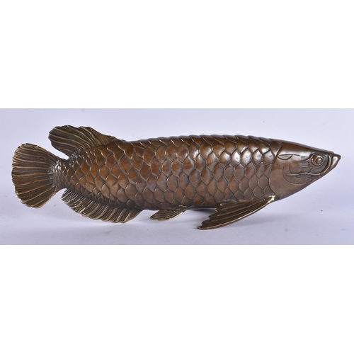 260 - A BRONZE FISH. 27cm wide.