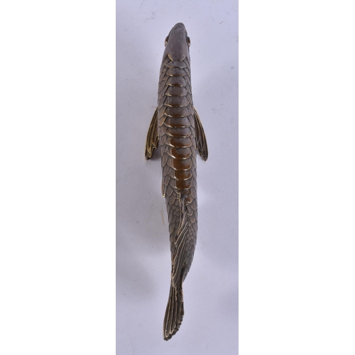 260 - A BRONZE FISH. 27cm wide.