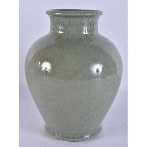 264 - AN UNUSUAL DANISH CELADON GLAZED VASE. 24 cm x 14 cm.