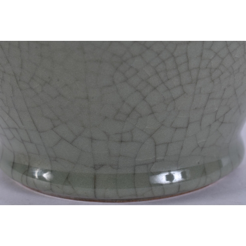 264 - AN UNUSUAL DANISH CELADON GLAZED VASE. 24 cm x 14 cm.