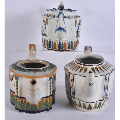 269 - THREE 18TH/19TH CENTURY PAINTED PEARLWARE TEAPOTS. Largest 20 cm wide. (3)