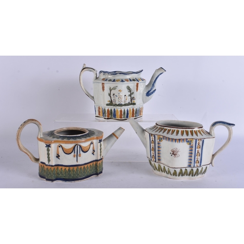 269 - THREE 18TH/19TH CENTURY PAINTED PEARLWARE TEAPOTS. Largest 20 cm wide. (3)