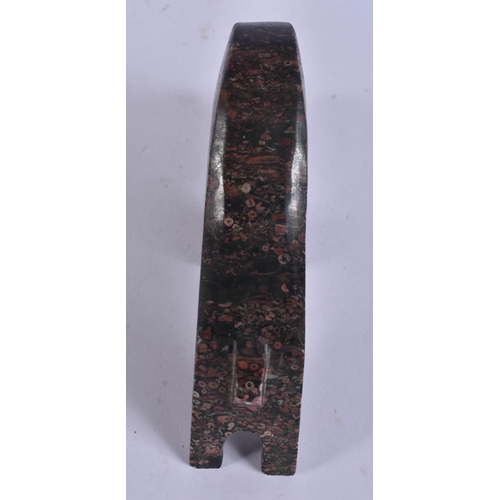 271 - A STYLISH PUDDINGSTONE CARVED ABSTRACT FIGURE OF A BULL. 17 cm wide.