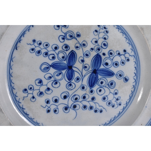 288 - A LARGE ANTIQUE DELFT FAIENCE TIN GLAZED POTTERY PLATE together with a large pearlware dish. 32 cm d... 