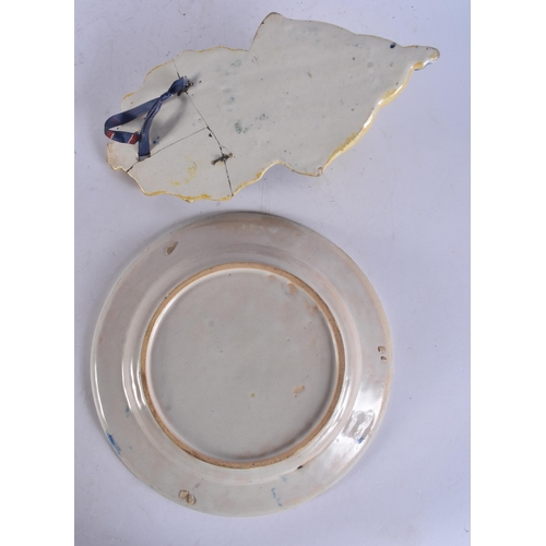 289 - AN ANTIQUE CONTINENTAL DELFT FAIENCE PLATE together with a faience font. Largest 29 cm long. (2)
