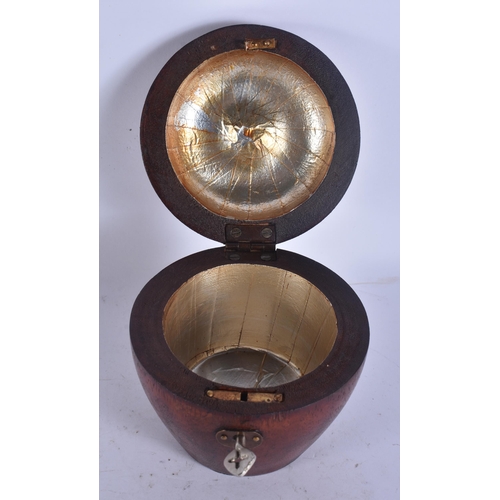 296 - A CARVED WOOD APPLE TEA CADDY. 13 cm high.