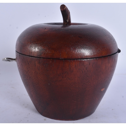 296 - A CARVED WOOD APPLE TEA CADDY. 13 cm high.