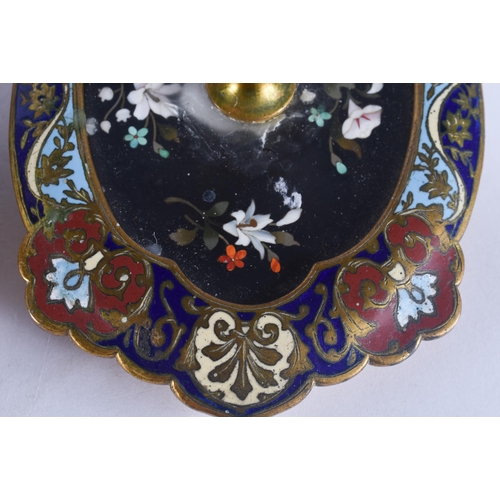 297 - AN UNUSUAL PAIR OF ANTIQUE PIETRA DURA CHAMPLEVE ENAMEL CHAMBERSTICKS. 21 cm wide.