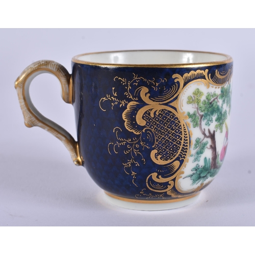 128 - AN EXTREMELY RARE 18TH CENTURY FRENCH VINCENNES PORCELAIN CUP AND SAUCER painted with blue scale bir... 