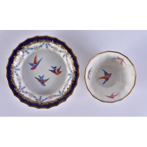 129 - A RARE 19TH CENTURY WORCESTER FACETTED TEABOWL AND SAUCER painted with birds. 10.5 cm wide. (2)