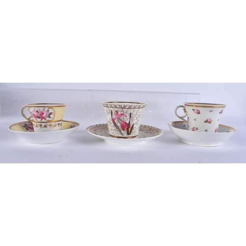 143 - THREE EARLY 19TH CENTURY CHAMBERLAINS WORCESTER FLORAL CUPS AND SAUCERS. (6)