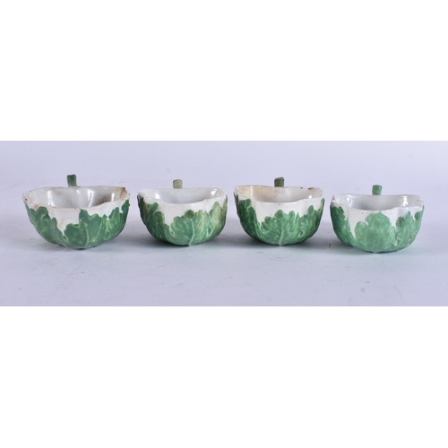 16 - A SET OF FOUR 18TH CENTURY ITALIAN PORCELAIN LEAF SHAPED DISHES painted with flowers. 9 cm wide. (4)
