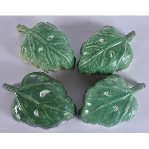 16 - A SET OF FOUR 18TH CENTURY ITALIAN PORCELAIN LEAF SHAPED DISHES painted with flowers. 9 cm wide. (4)