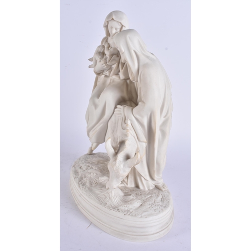 17 - A RARE VICTORIAN PARIAN WARE NATIVITY FIGURAL GROUP modelled with the baby Jesus on a donkey. 30 cm ... 
