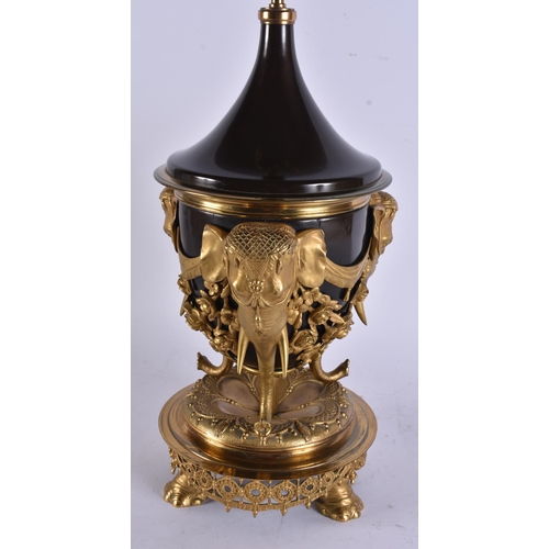 2 - A FINE 19TH CENTURY EUROPEAN BRONZE AND GILT BRONZE COUNTRY HOUSE LAMP formed with three elephants, ... 
