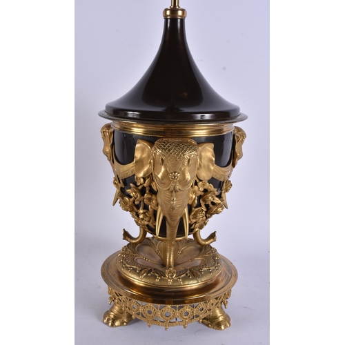 2 - A FINE 19TH CENTURY EUROPEAN BRONZE AND GILT BRONZE COUNTRY HOUSE LAMP formed with three elephants, ... 