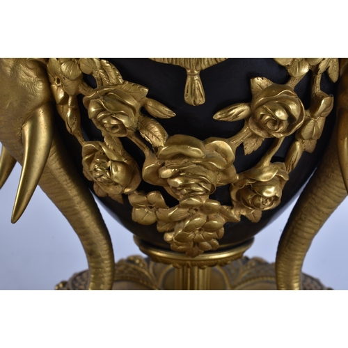 2 - A FINE 19TH CENTURY EUROPEAN BRONZE AND GILT BRONZE COUNTRY HOUSE LAMP formed with three elephants, ... 