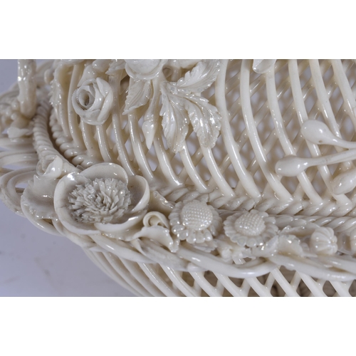 21 - A FINE IRISH BELLEEK PORCELAIN TWIN HANDLED BASKET AND COVER. 21 cm x 13 cm.