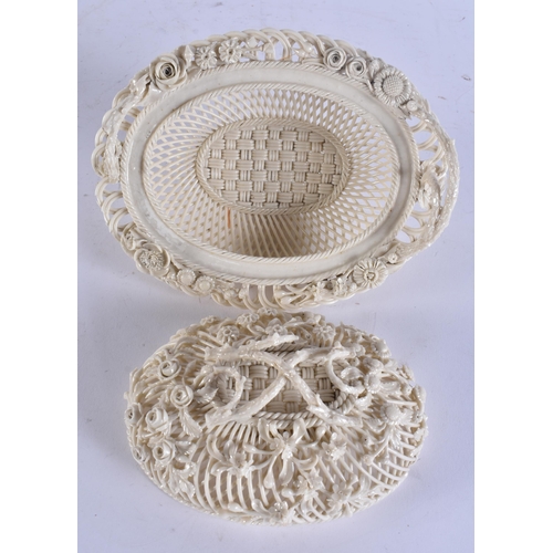 21 - A FINE IRISH BELLEEK PORCELAIN TWIN HANDLED BASKET AND COVER. 21 cm x 13 cm.