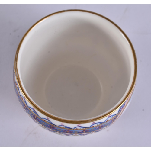 4 - AN ANTIQUE FRENCH SEVRES PORCELAIN BOWL painted with landscapes. 7 cm wide.