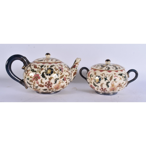 45 - AN UNUSUAL HUNGARIAN ZSOLNAY PECS TEA SERVICE painted with Islamic foliage. Largest 25 cm wide. (qty... 