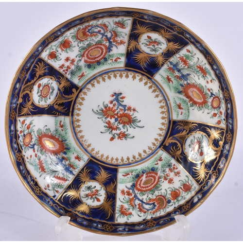 54 - AN EARLY 19TH CENTURY CHAMBERLAINS WORCESTER TRIO painted with flowers on a blue scale ground. 12.5 ... 