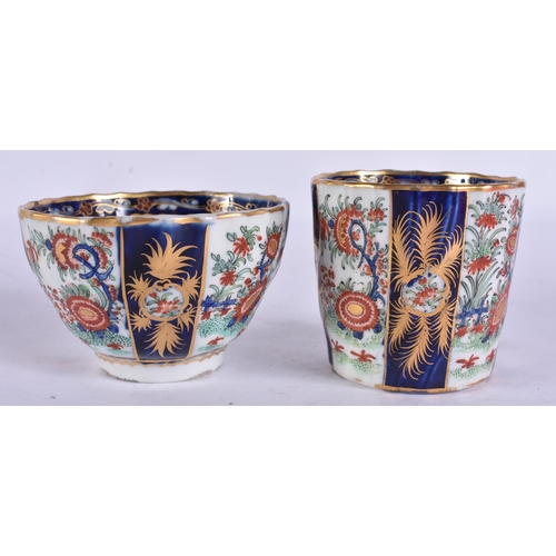 54 - AN EARLY 19TH CENTURY CHAMBERLAINS WORCESTER TRIO painted with flowers on a blue scale ground. 12.5 ... 