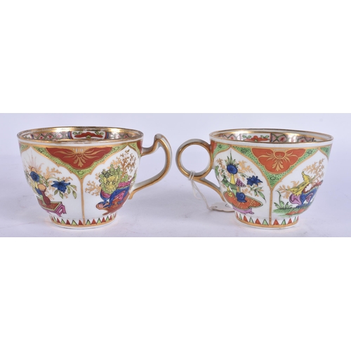 57 - TWO EARLY 19TH CENTURY CHAMBERLAINS WORCESTER CUPS AND SAUCER painted with Dragons in Compartments. ... 