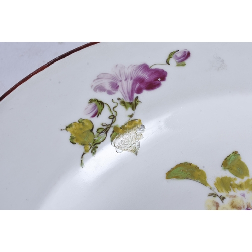 6 - AN ANTIQUE VIENNA PORCELAIN BOTANICAL PLATE painted with flowers. 24 cm wide.