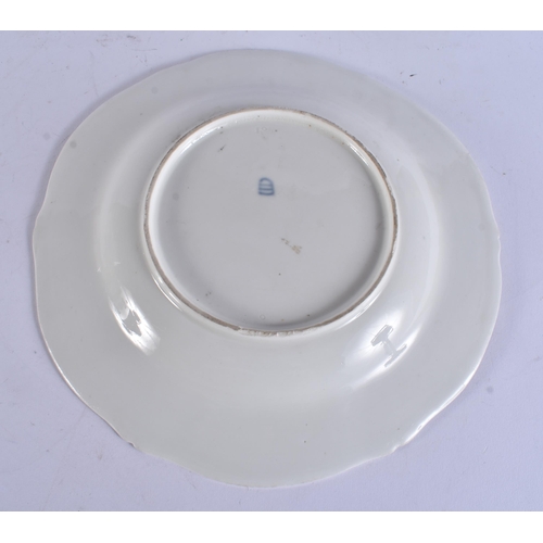 6 - AN ANTIQUE VIENNA PORCELAIN BOTANICAL PLATE painted with flowers. 24 cm wide.