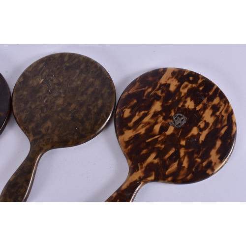 11 - FIVE VINTAGE FAUX TORTOISESHELL VANITY MIRRORS. 34 cm long. (5)